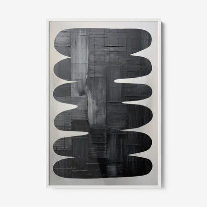 abstract wall art in black tones framed in white