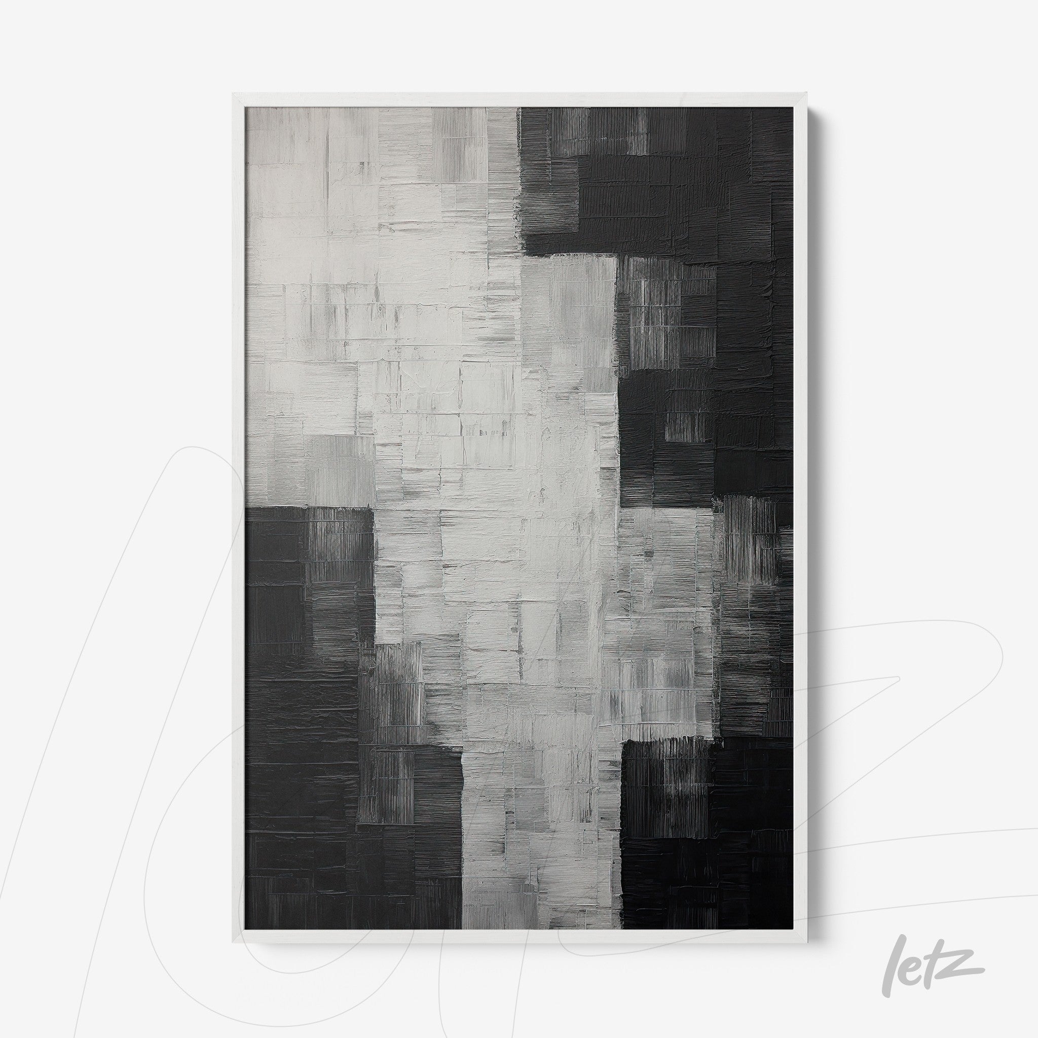 abstract wall art in black and white with layered textures, framed in white