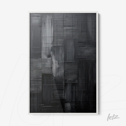 abstract wall art with textured black and gray design in white frame