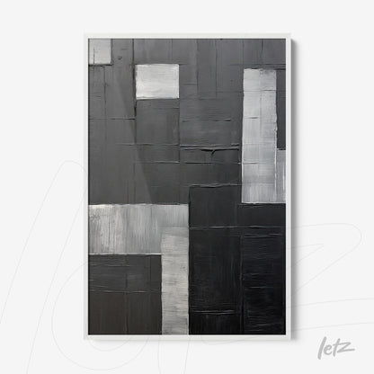 abstract artwork in shades of black and gray with textured patterns in white frame