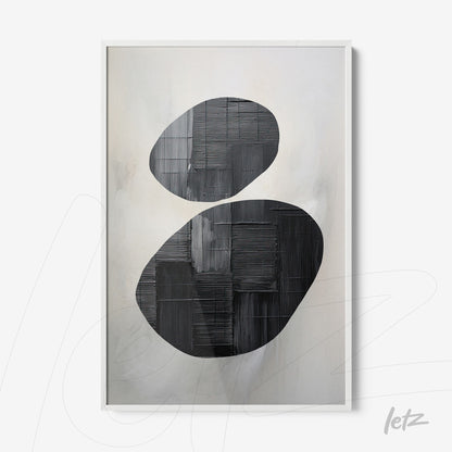 abstract wall art featuring black oval shapes on a soft light background with a white frame