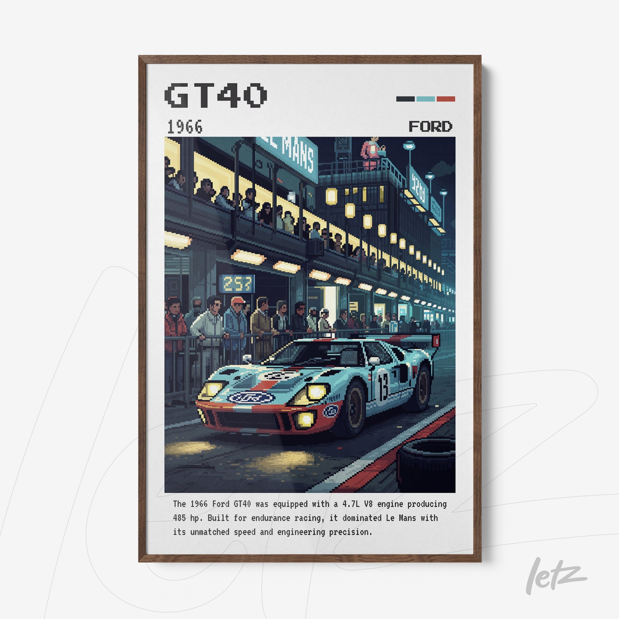 framed artwork of the 1966 ford gt40 race car in front of a le mans pit stop