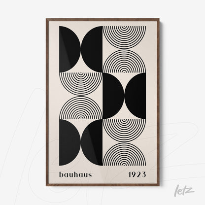 framed geometric design inspired by bauhaus featuring black circles and semicircles with wooden frame
