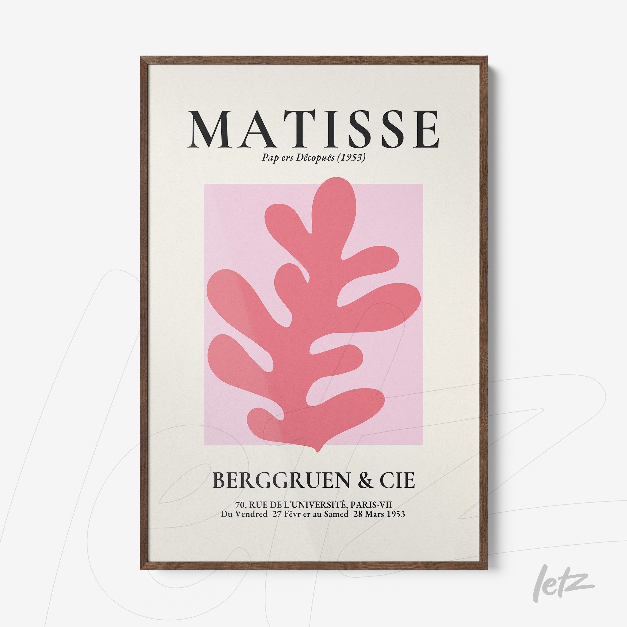 framed wall art featuring a pink shape on light background by Matisse with dark wooden frame