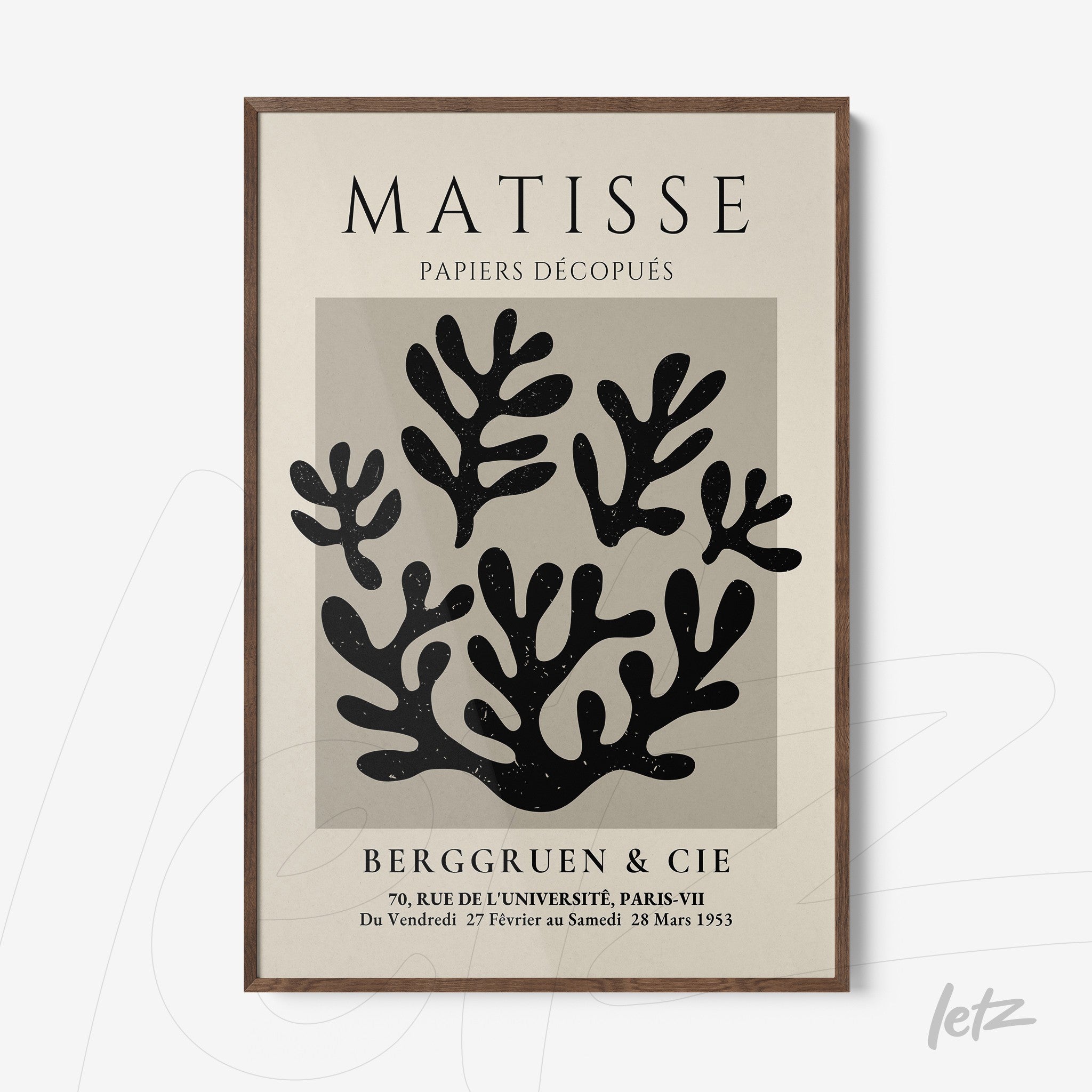 decorative wall art featuring cut-out style leaves design in dark wood frame
