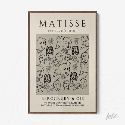 modern style framed artwork featuring stylized faces on gray background with light wood frame