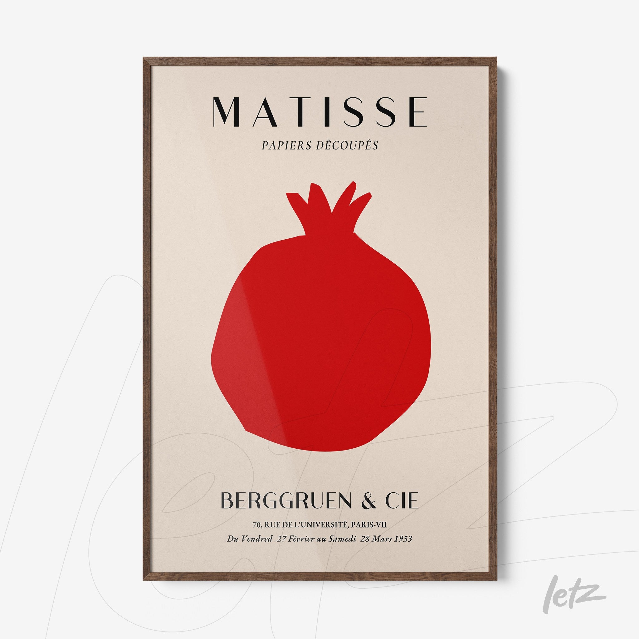framed contemporary art of pomegranate in red silhouette against a white background