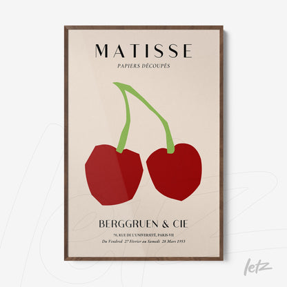 framed modern artwork of stylized cherries in dark wood frame