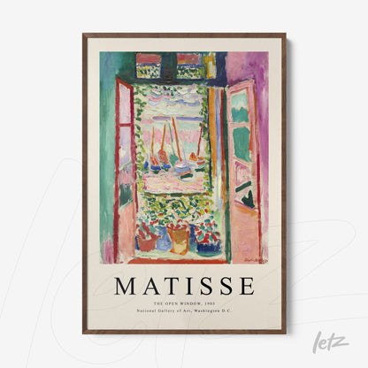 framed artwork by Matisse featuring an open window with potted flowers and an outdoor view, displayed in a dark wood frame