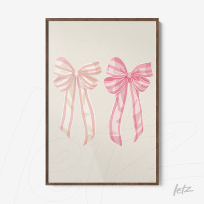 framed artwork featuring pink bow illustrations with dark wood frame