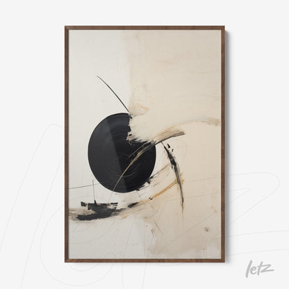 framed abstract art featuring a black circular shape on a light background with dark wood frame