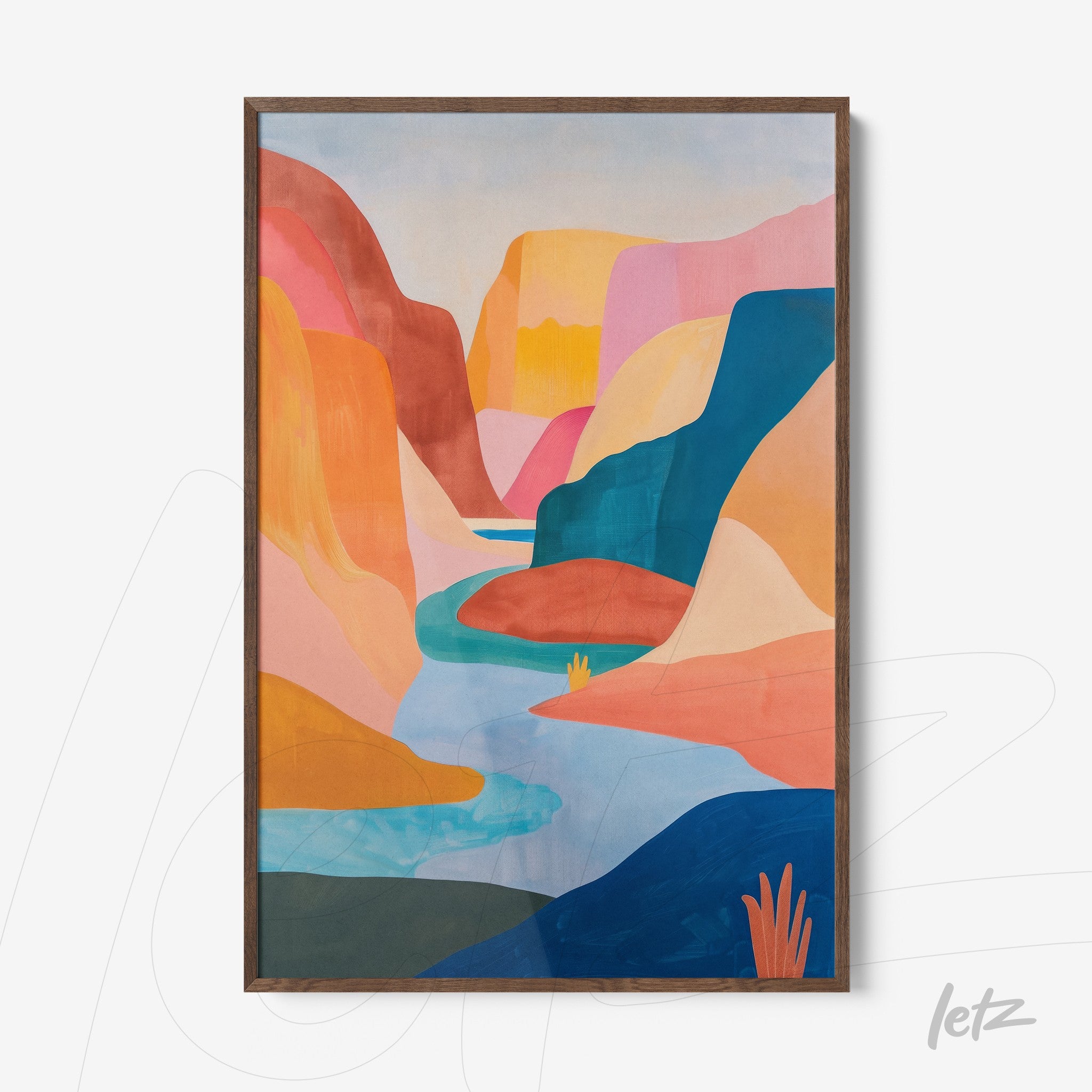 framed abstract art depicting a canyon landscape with vibrant colors and a blue river
