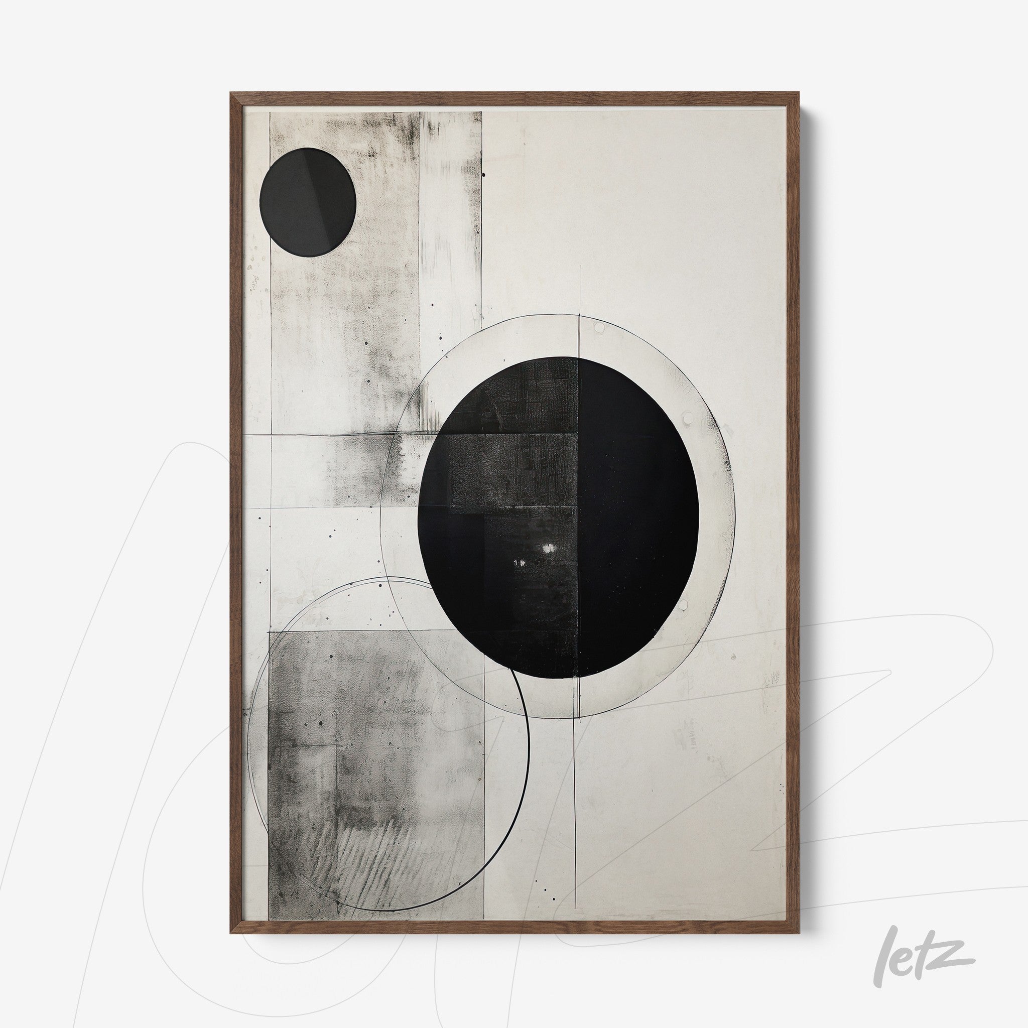 abstract wall art in black and white featuring geometric circles on a light background with natural wood frame