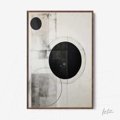 abstract wall art in black and white featuring geometric circles on a light background with natural wood frame