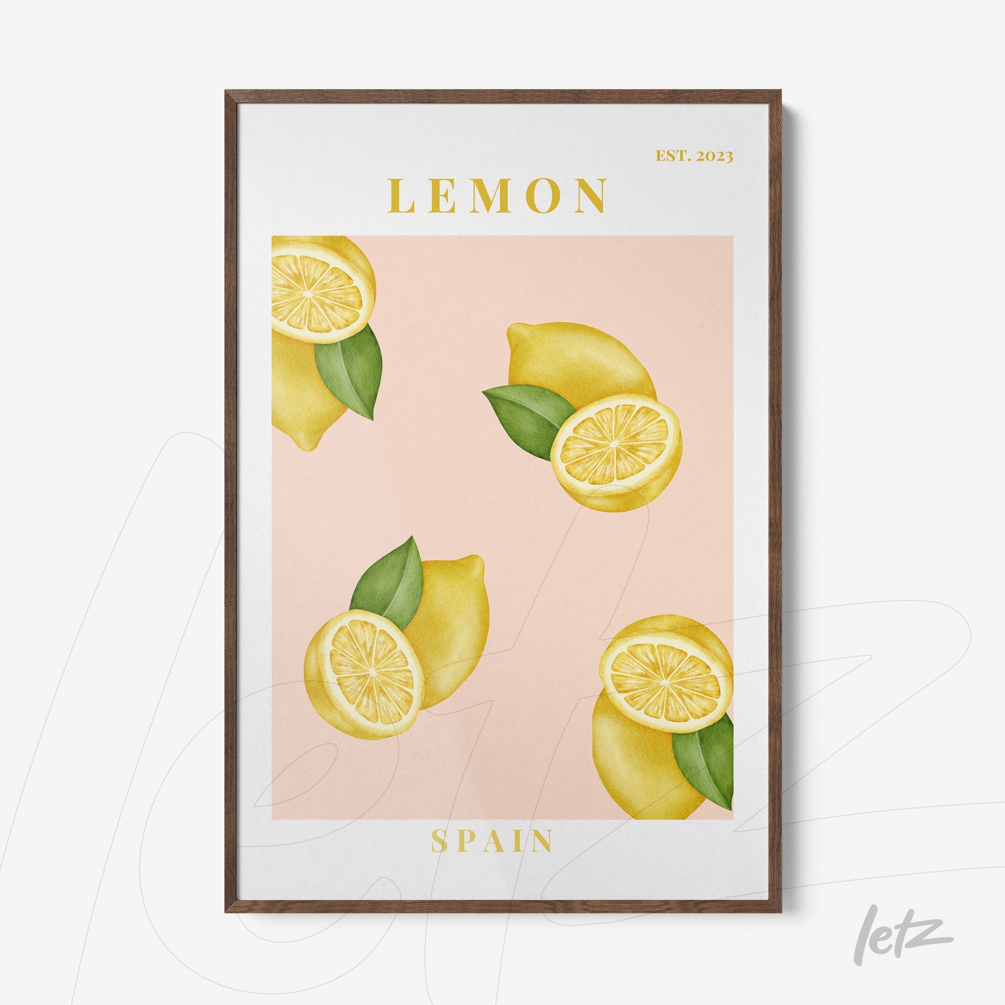 framed artwork featuring lemons on pink background with dark wood frame