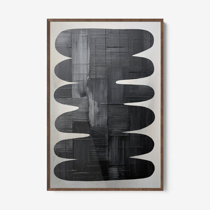 abstract wall art in shades of black with light wood frame