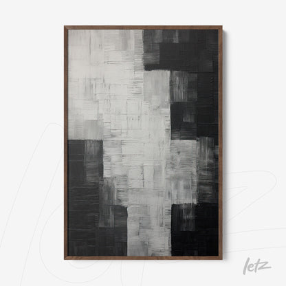 abstract wall art in black and white featuring rich texture, set in a dark wood frame