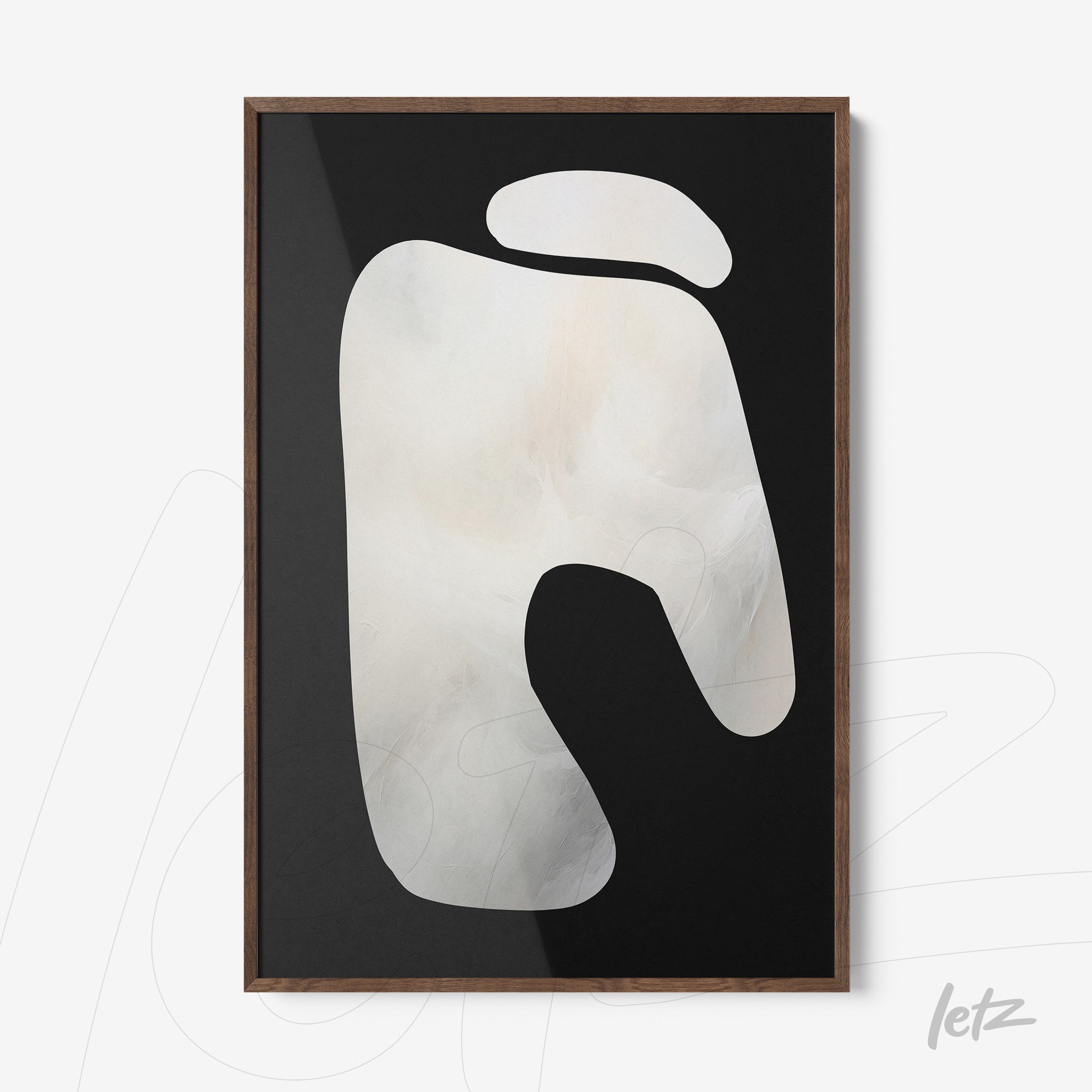 framed abstract artwork on black background featuring an organic shape in light gray and white tones with dark wood frame