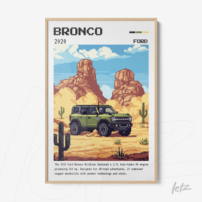 pixel art print of the 2020 Ford Bronco in light wood frame against desert backdrop