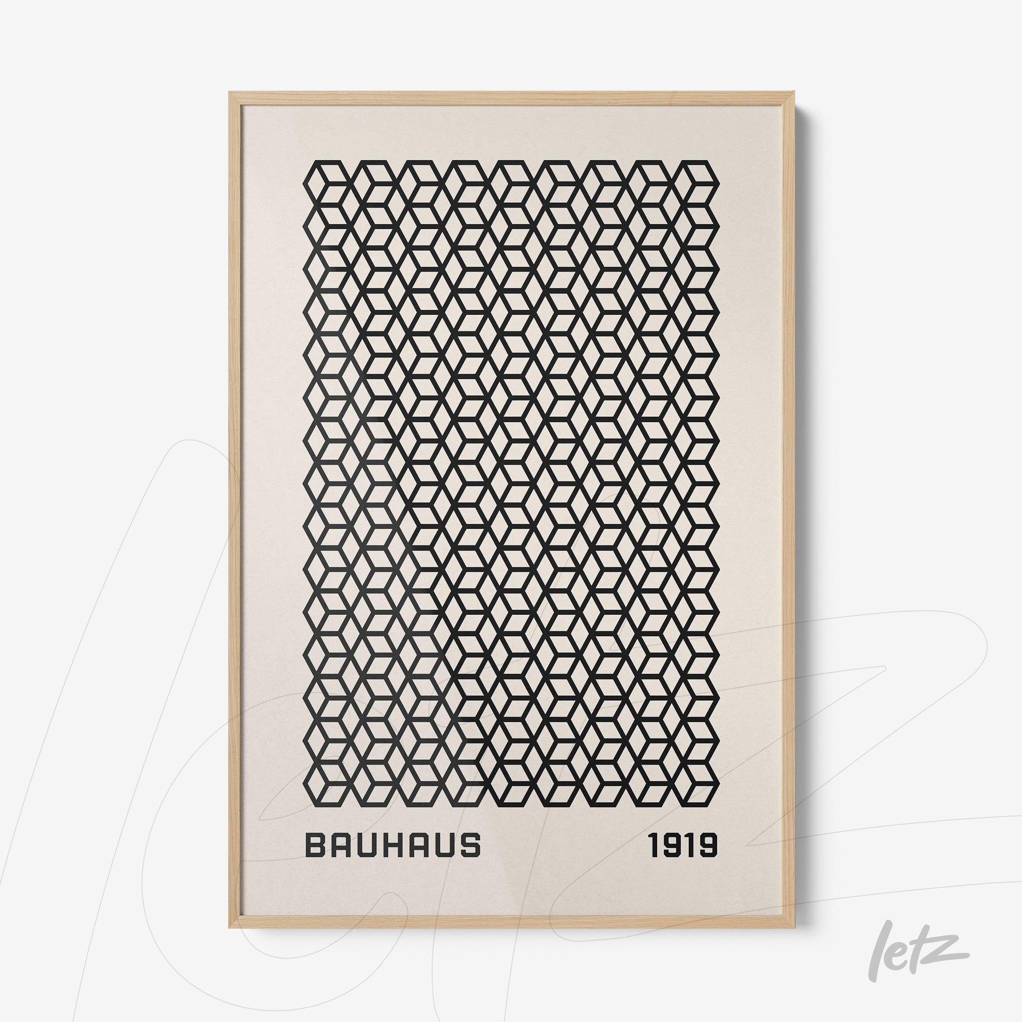 poster print with black geometric pattern and text bauhaus 1919 in light wood frame