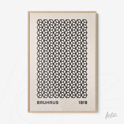 poster print with black geometric pattern and text bauhaus 1919 in light wood frame