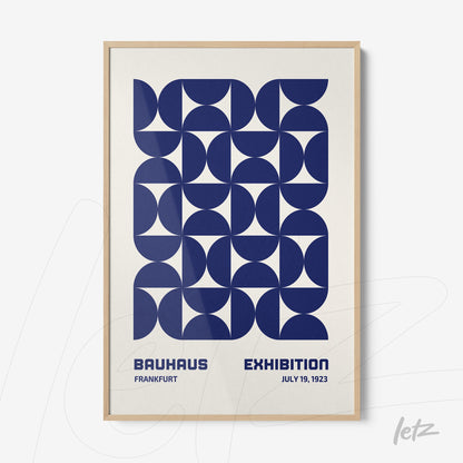 poster featuring blue geometric art in a light wood frame