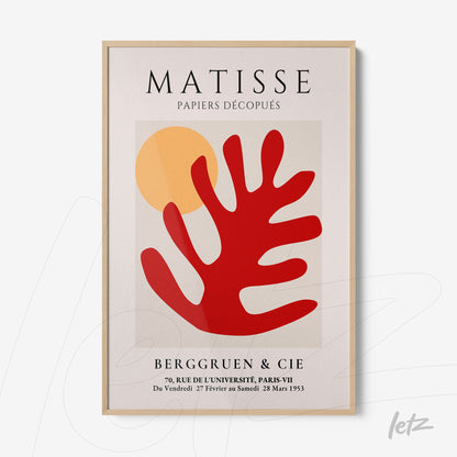 framed art print inspired by Matisse with abstract red and yellow shapes on light background in light wood frame