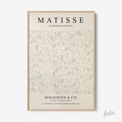 framed vintage style art of flowers in soft colors with light frame