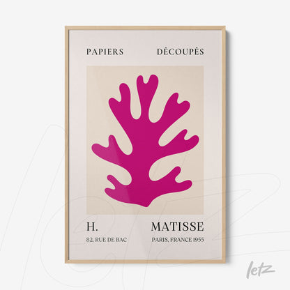 modern wall art featuring a pink coral shape, framed in light wood