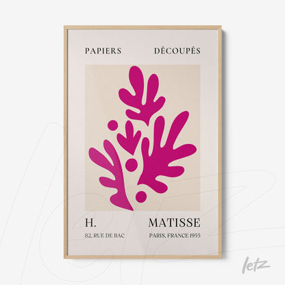framed modern art piece featuring pink botanical shapes on a light background with natural wood frame