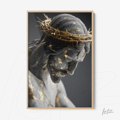 framed artwork featuring a sculpture of Christ with a crown of thorns and golden details in light wood frame