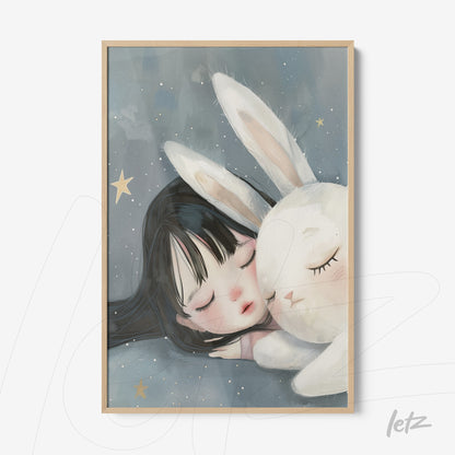 framed wall art depicting a child sleeping next to a white rabbit on a starry background