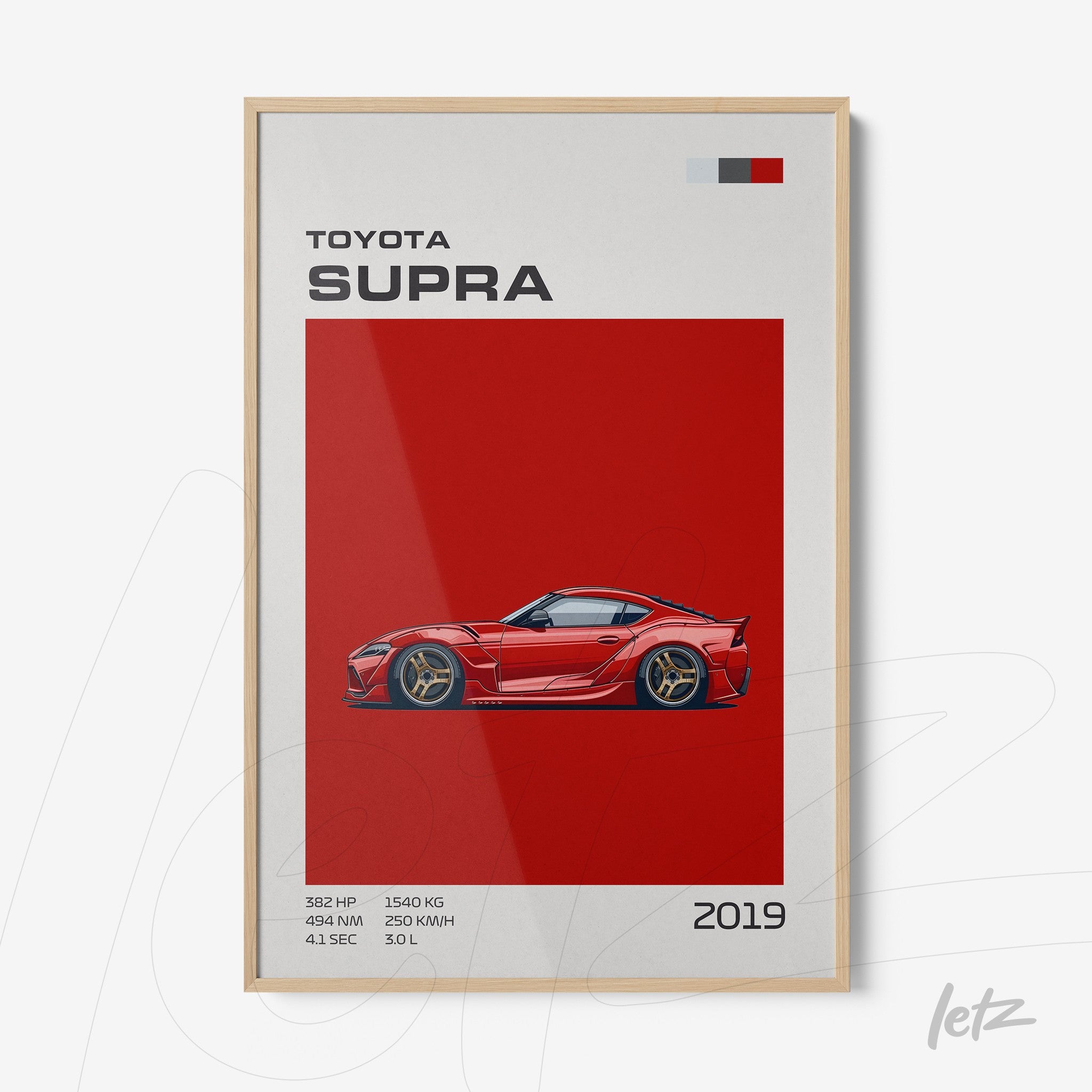 framed wall art featuring the 2019 Toyota Supra car illustration with a light wood frame and red background