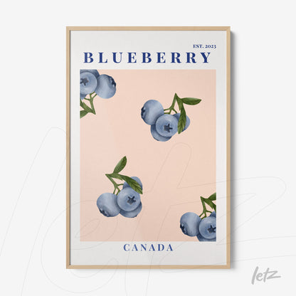 framed artwork featuring blueberries on a light pink background with a light wood frame