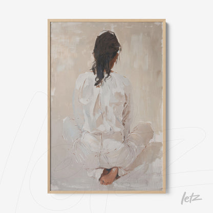 contemporary framed artwork of a woman sitting with her back turned, featuring neutral tones with a light frame