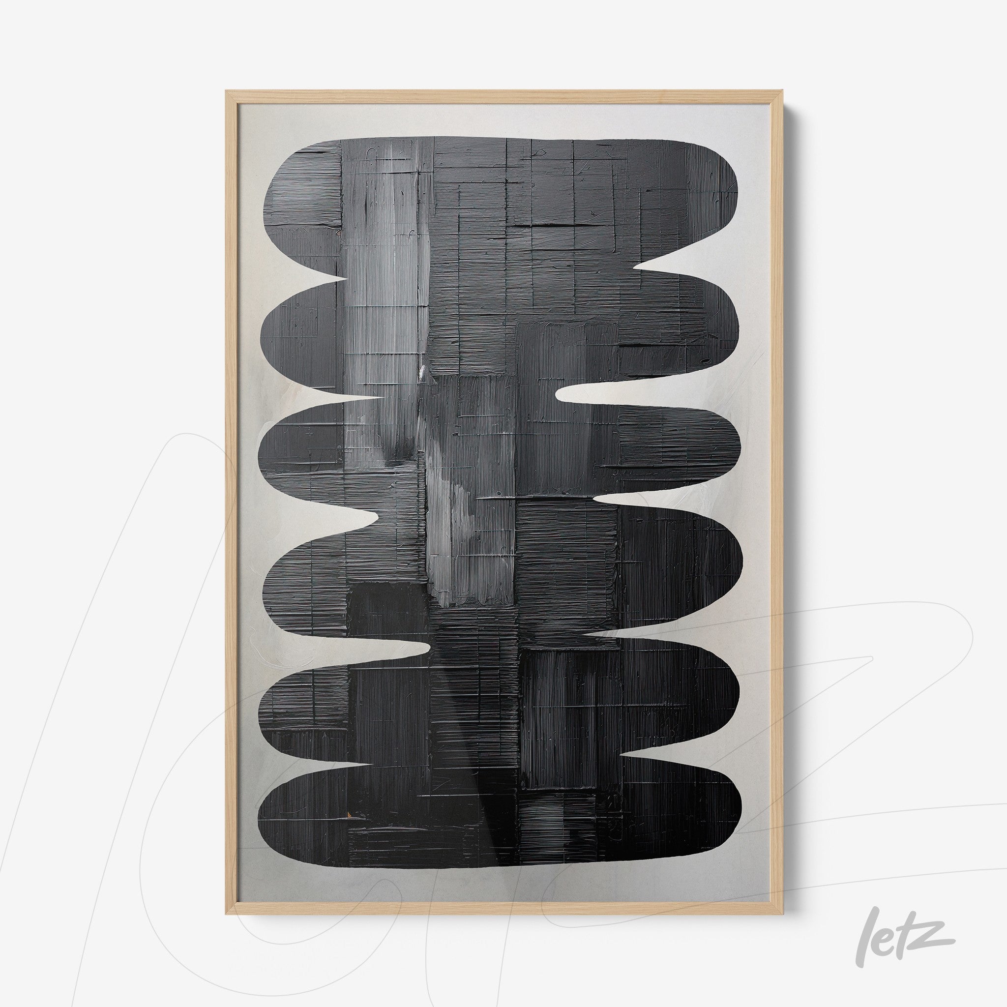 abstract wall art in black tones with light wooden frame