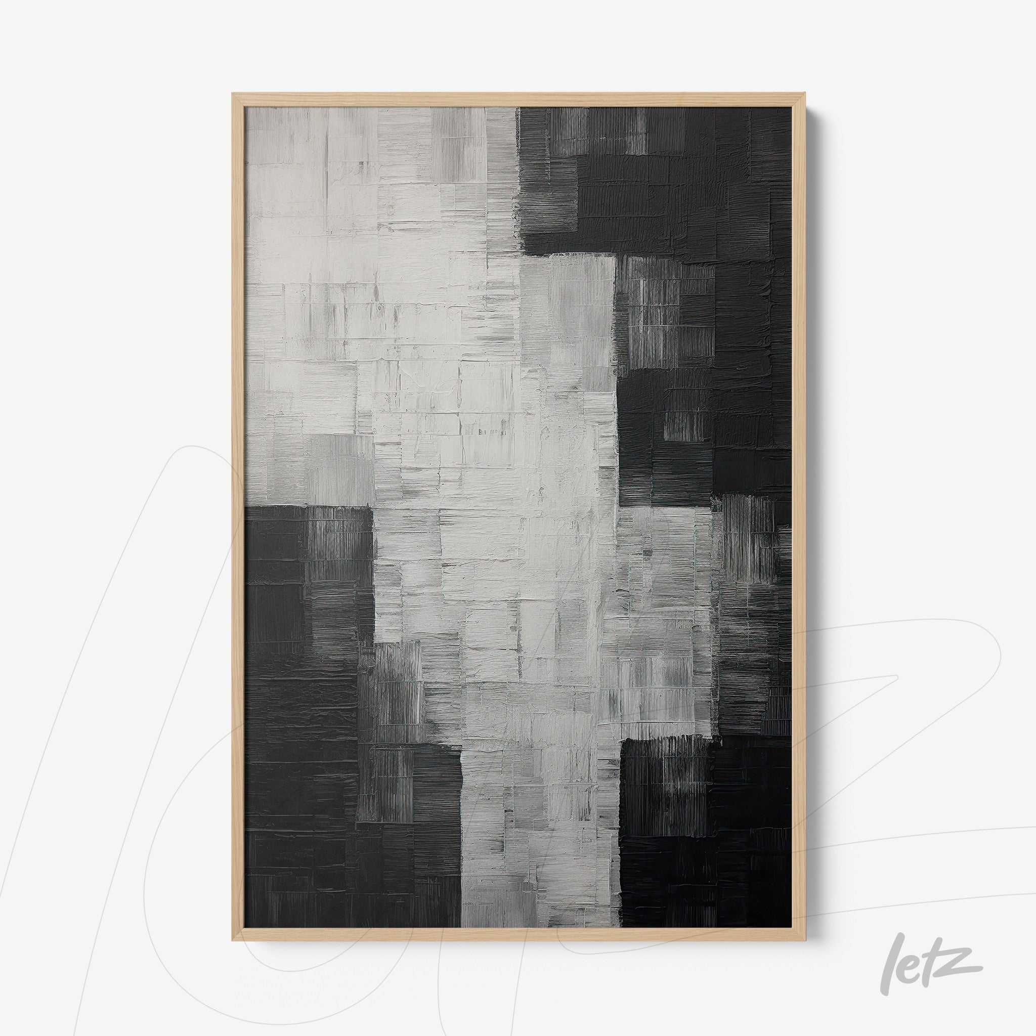 abstract wall art in black and white featuring bold texture in light wood frame