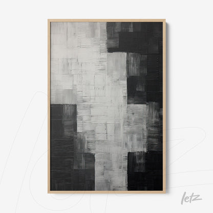abstract wall art in black and white featuring bold texture in light wood frame
