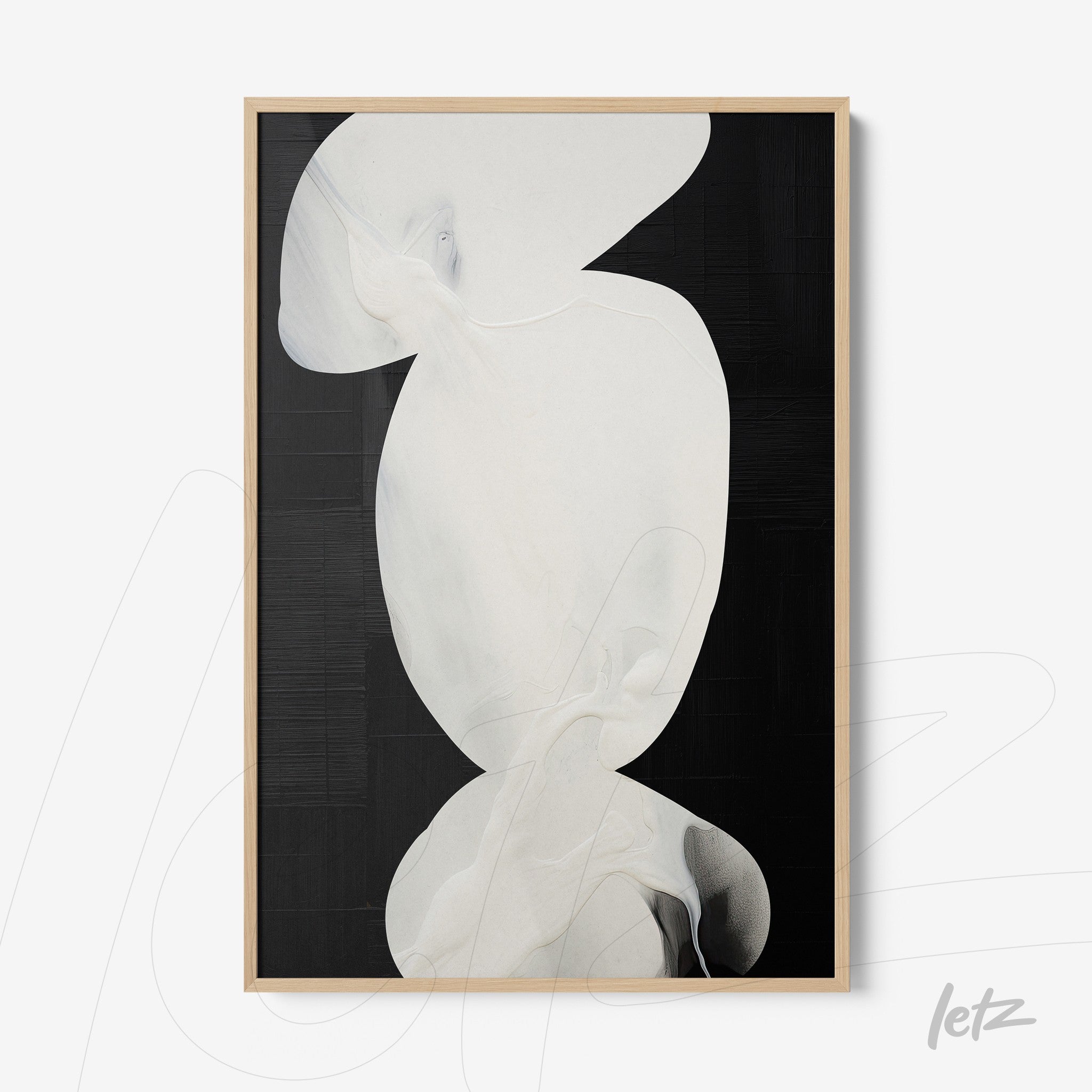 abstract wall art featuring white and black tones with light wooden frame