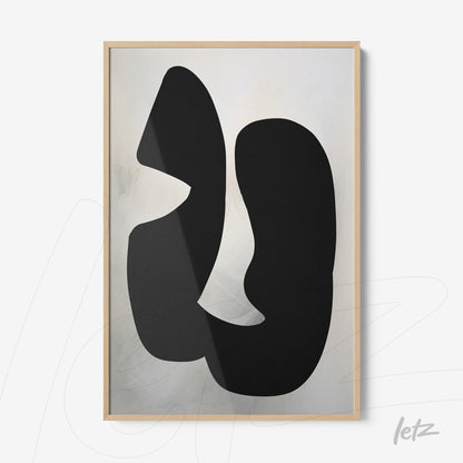 decorative wall art featuring an abstract black shape on a light background with a light wood frame