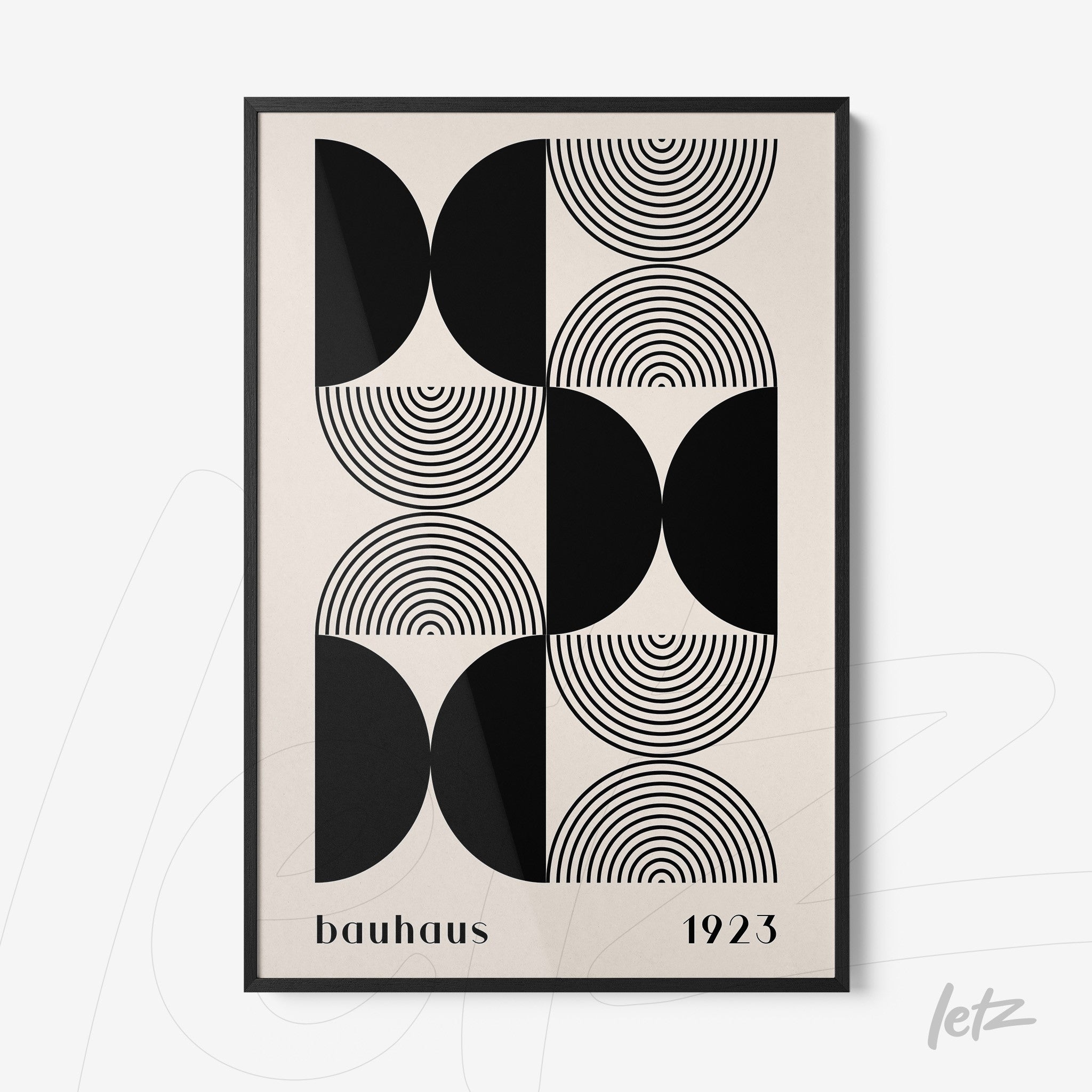 black and white geometric Bauhaus design in a black frame with text 'bauhaus 1923'
