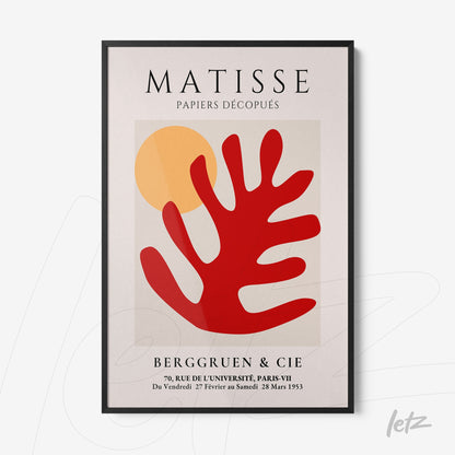 framed wall art featuring abstract shapes in red and yellow, inspired by Matisse, with black frame