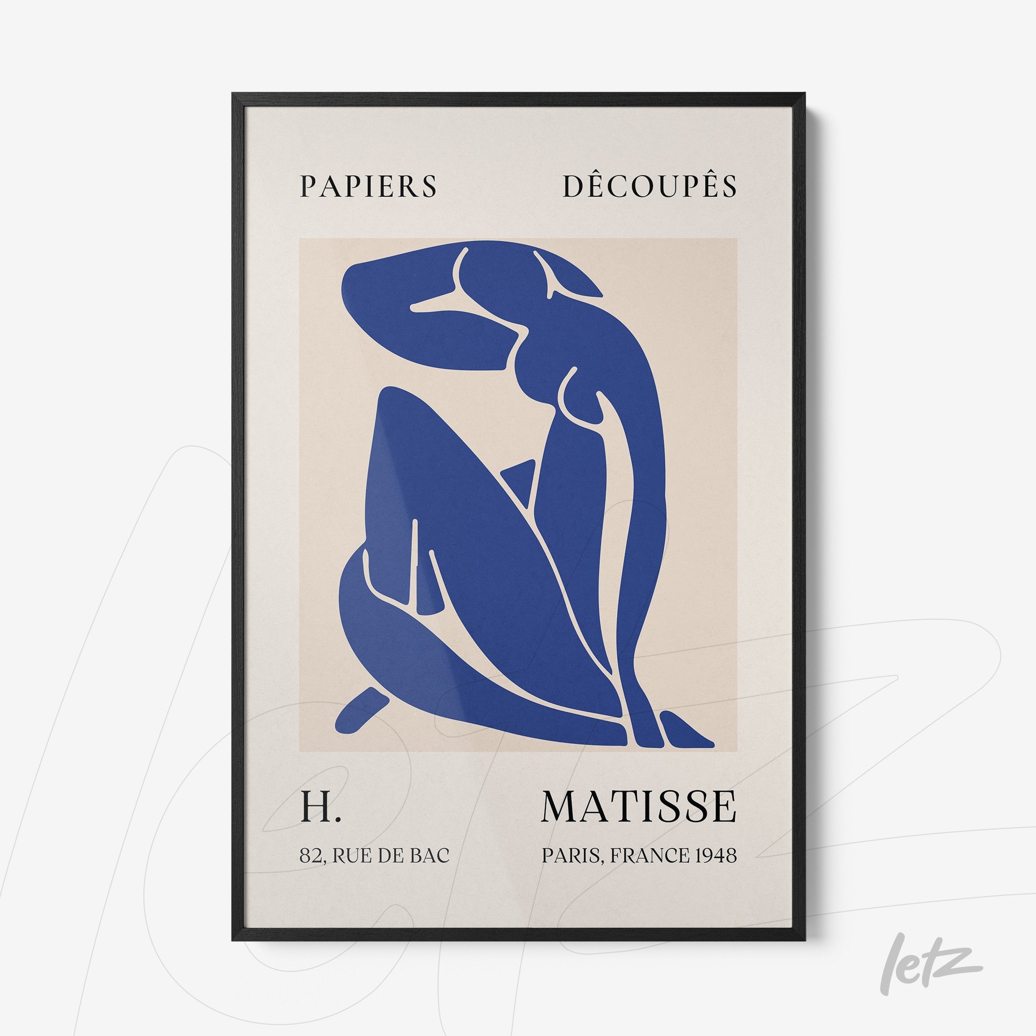 framed minimalist art featuring a blue female figure on a light background with elegant black frame