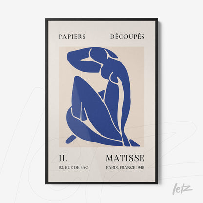 framed minimalist art featuring a blue female figure on a light background with elegant black frame