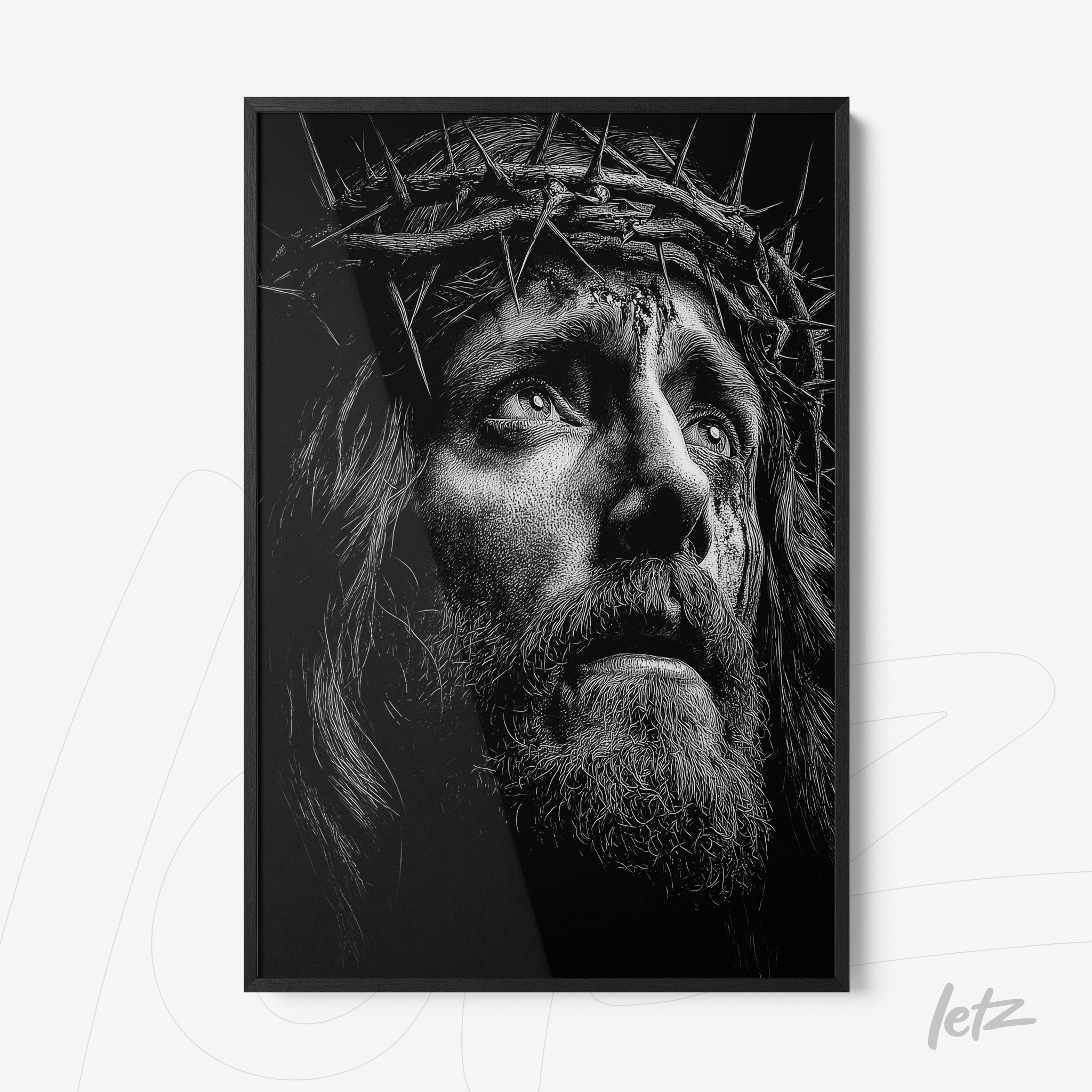 black and white framed artwork featuring a dramatic portrait of Jesus Christ wearing a crown of thorns