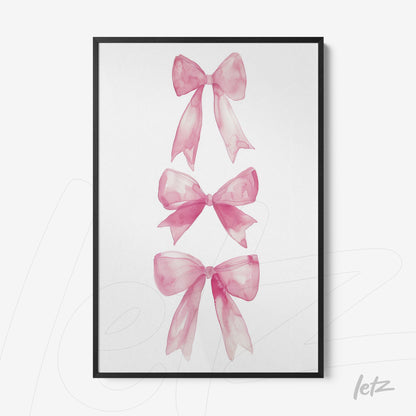 framed wall art featuring watercolor illustrations of pink bows
