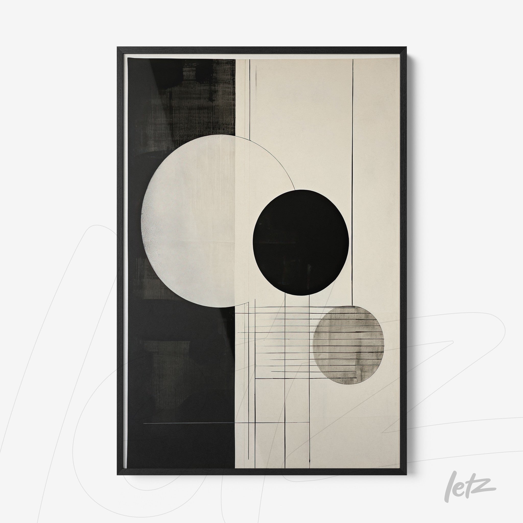 framed abstract wall art in black and white featuring circles and lines on a light background