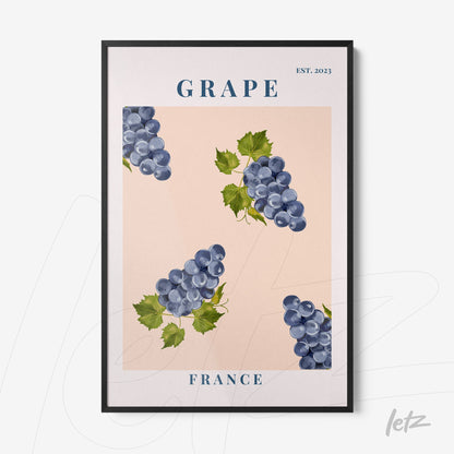 framed artwork featuring blue grapes on a pink background with black frame