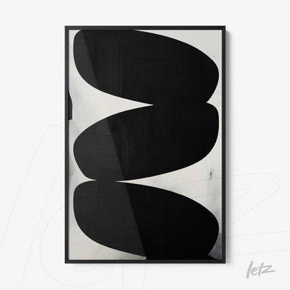 framed artwork with abstract black and white design in sleek black frame