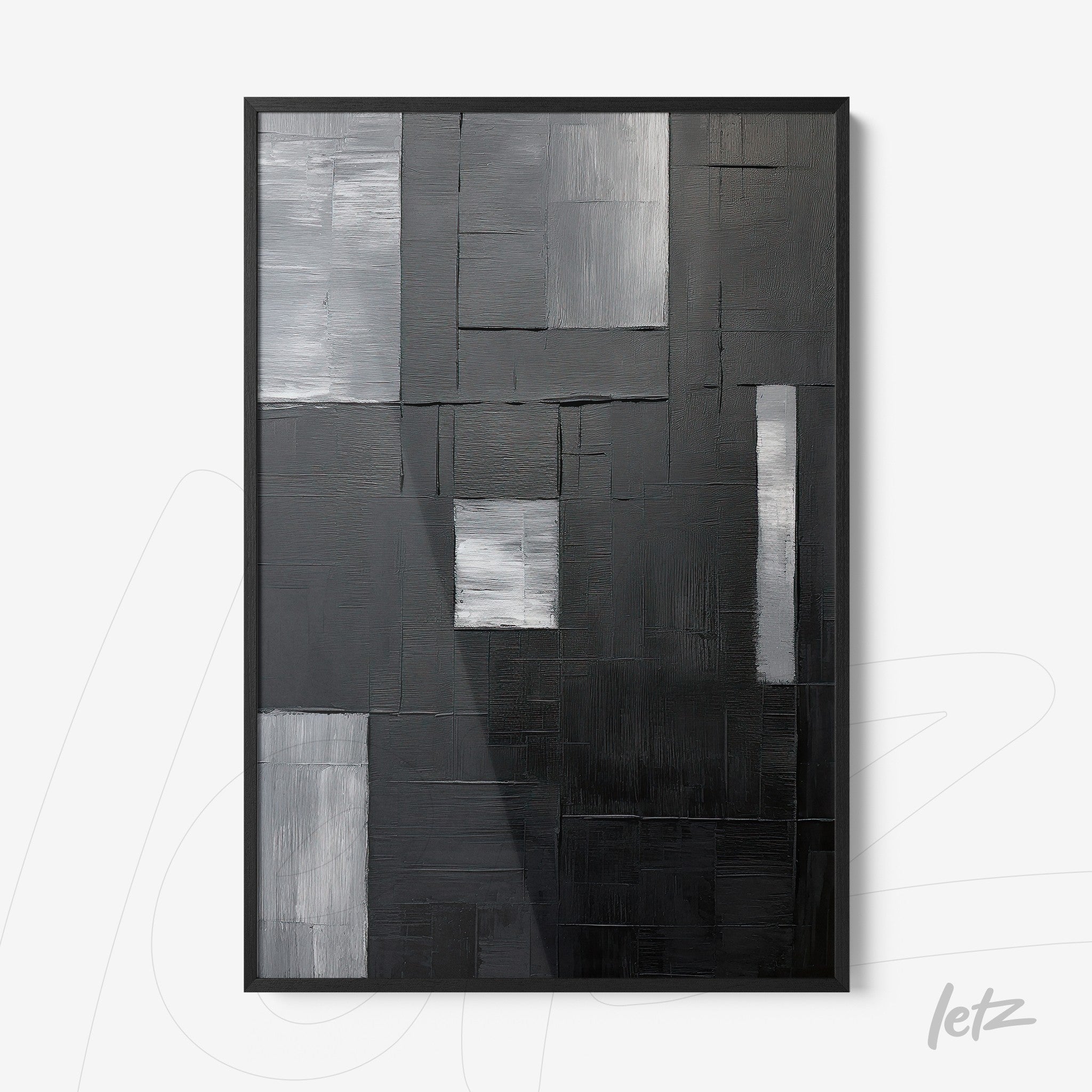 abstract wall art in black and white featuring geometric shapes on textured background with black frame